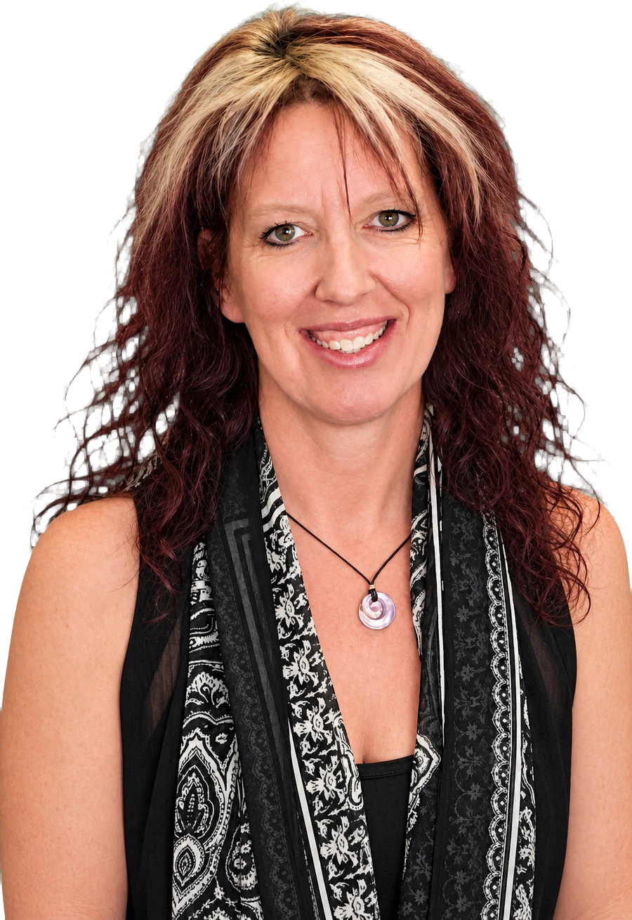 ReNae Schramm, smiling in a black and white scarf